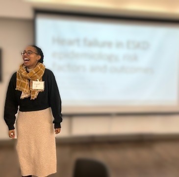 Trainee presenting at January 2025 retreat.