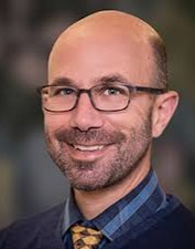 Headshot of Ari Pollack